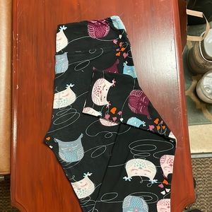 Multi-colored owl leggings. Does not have a brand tag. Very soft material, comfy